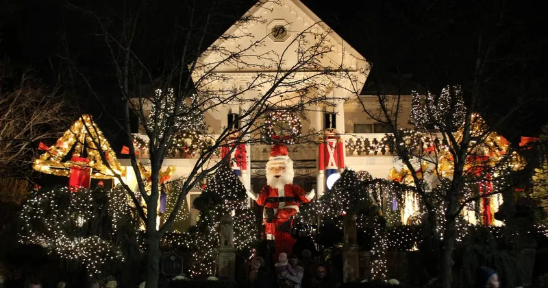 Visitors on a Bay Ridge and Dyker Heights Christmas lights NYC bus tour walking past lit houses in Brooklyn