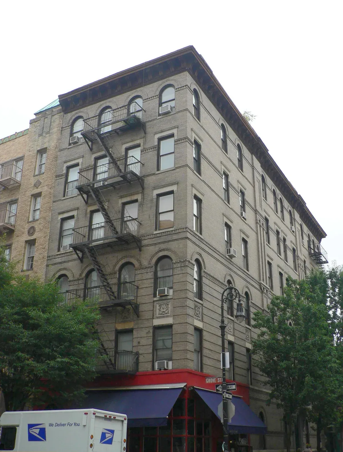 The corner apartment building at Bedford and Grove Streets in the West Village, known from Friends and passed on NYC TV and movie bus tours