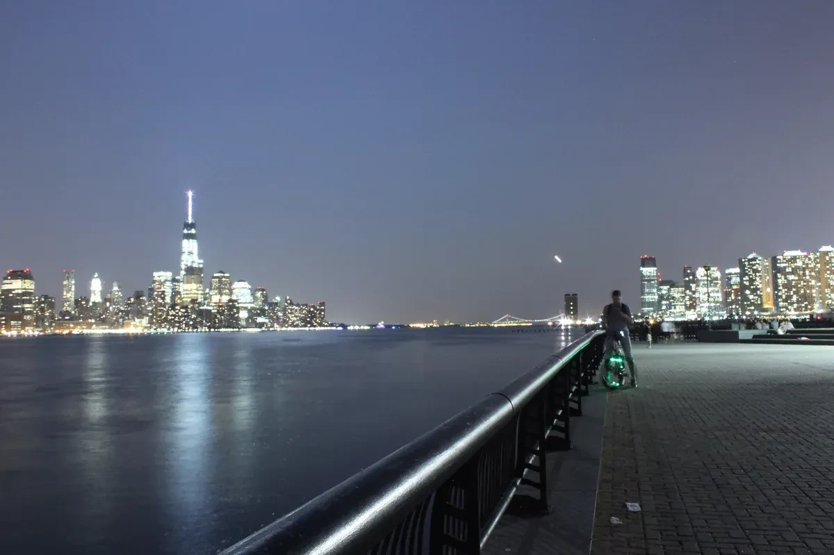 Manhattan from the Hoboken waterfront at night on a NYC night bus tour